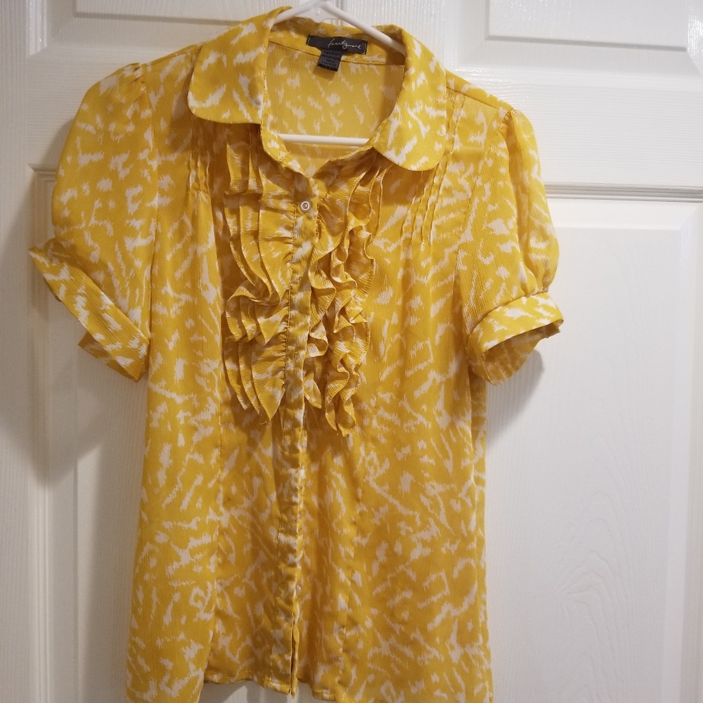 Yellow see through blouse.